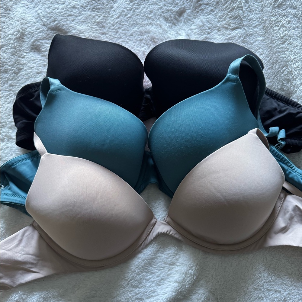 Victoria's Secret Black, Teal, and Cream Bra Trio